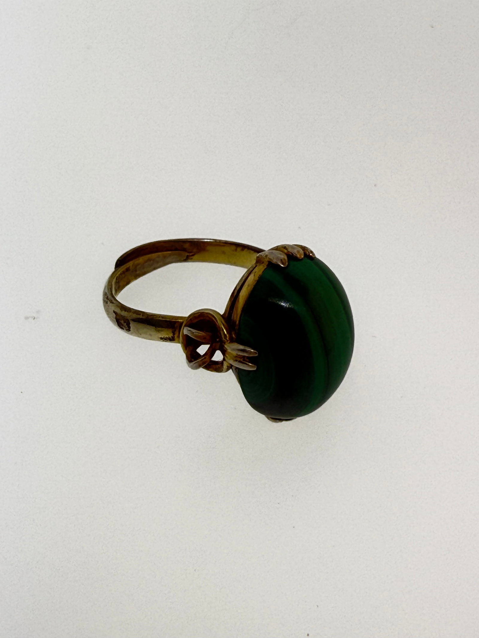 White Metal and Malachite Rnig Adjustable 5.5g: "This is a continuation of our Pro Jeweler's Estate auctions. This auction includes his personal bolo tie collection as well as several of his own art jewelry pieces. There are other Southwest styled 