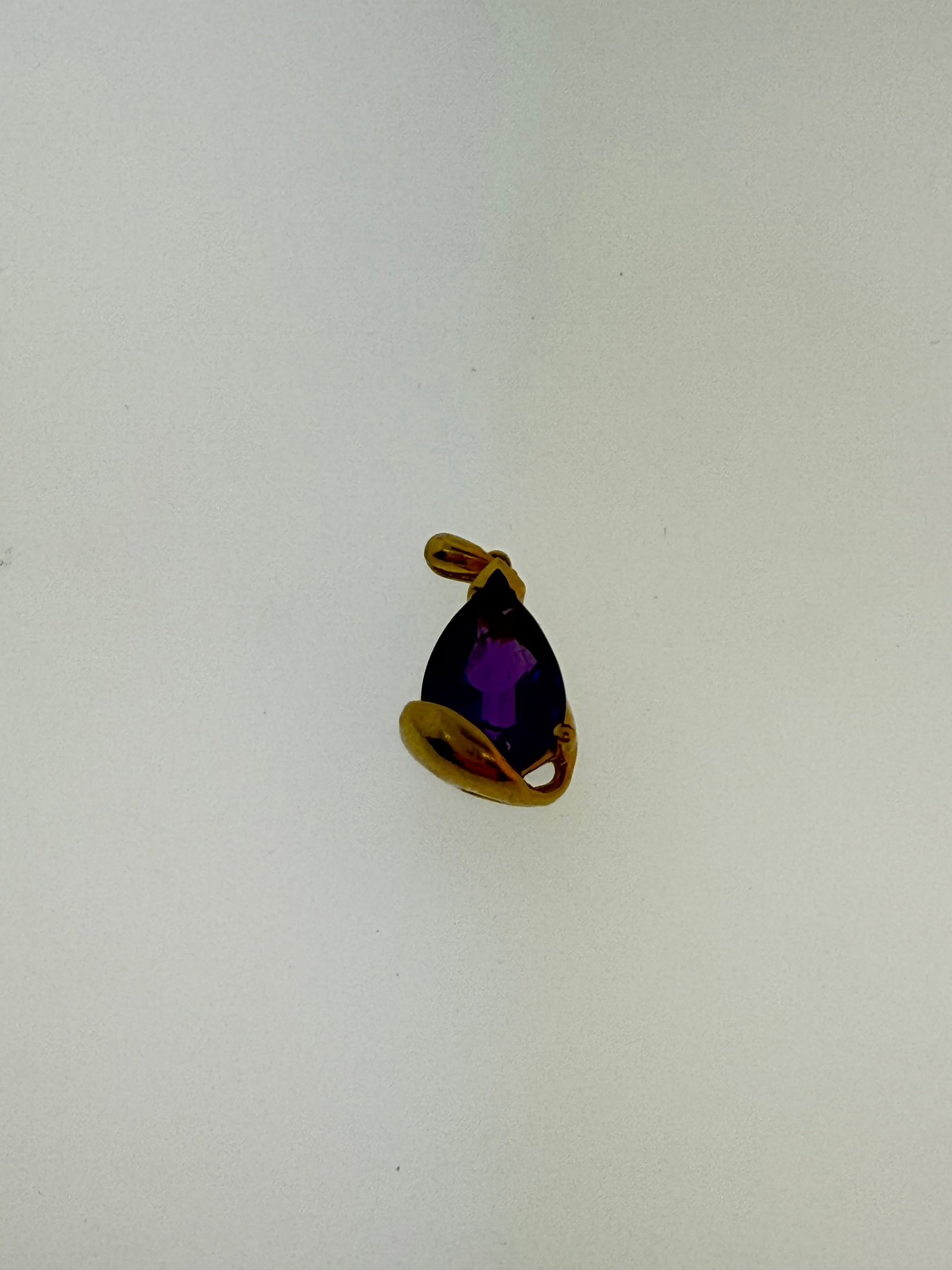 Amethyst and 14k Gold Pendant: "This is a continuation of our Pro Jeweler's Estate auctions. This auction includes his personal bolo tie collection as well as several of his own art jewelry pieces. There are other Southwest styled 