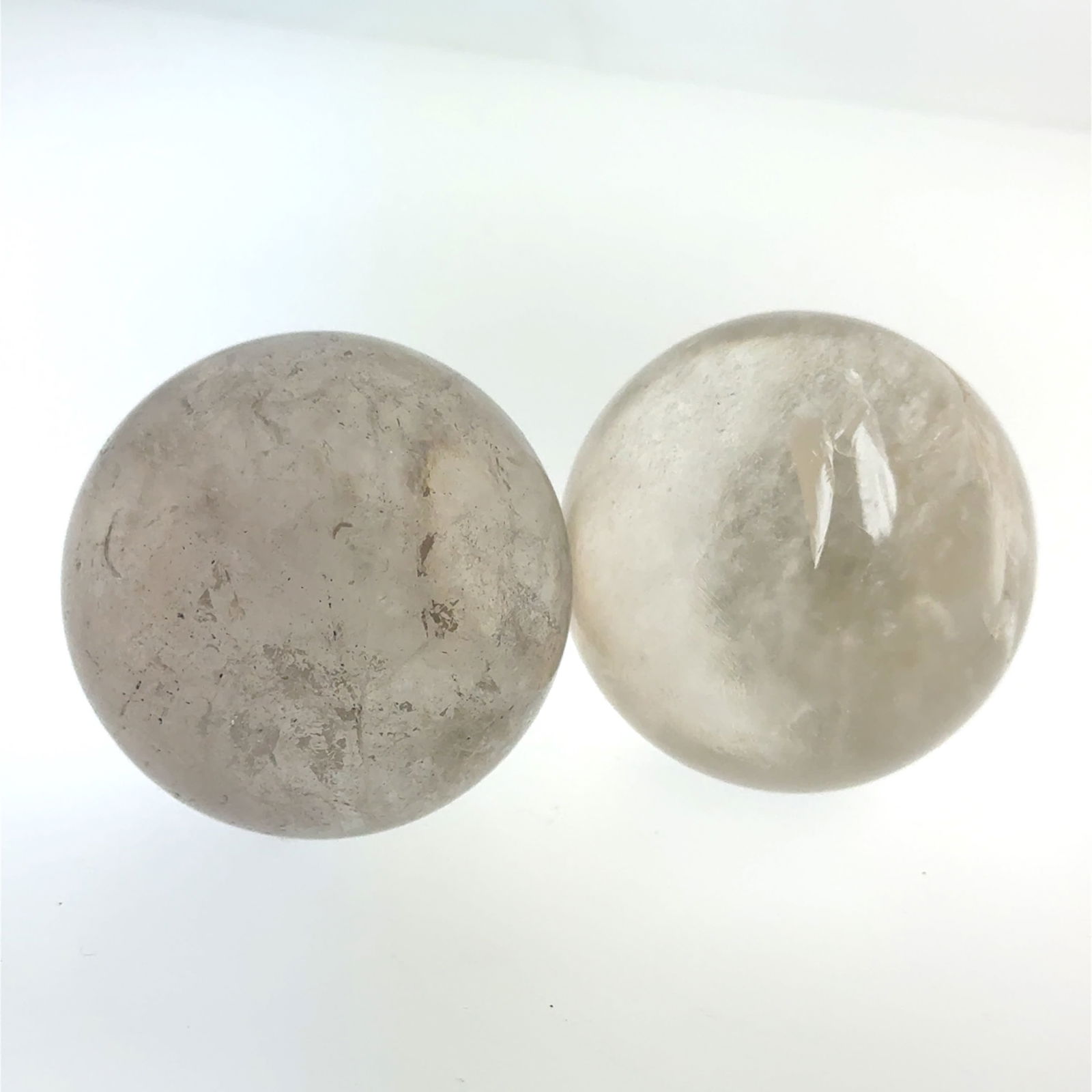 Pair of Quartz Spheres 18mm: This is a continuation of our pro jeweler's estate auction, but we've added some gems from another estate (JTV). The rest are from his personal collection, many faceted by himself. Gems were cataloged