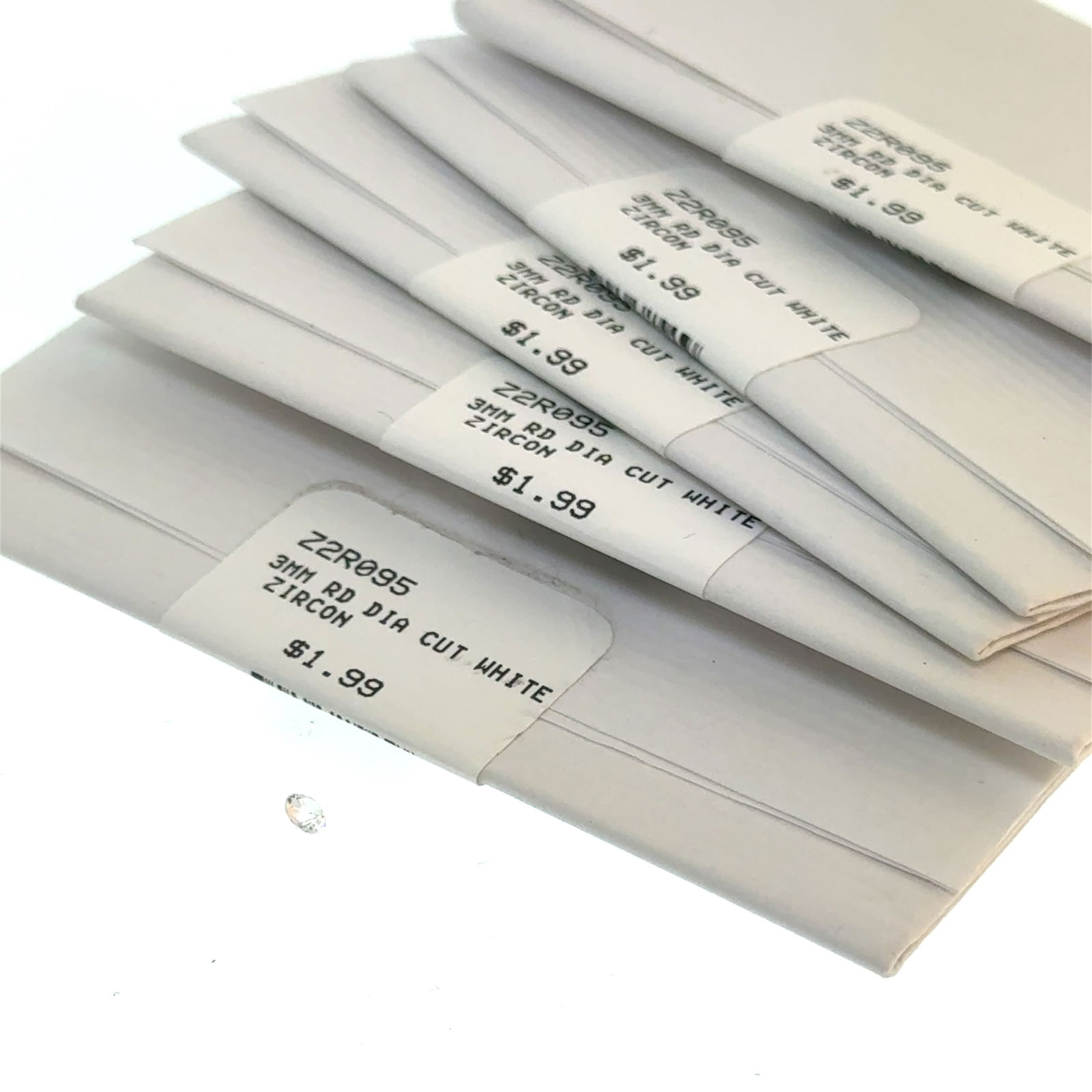 6 x .3mm White Zircon Gemstones: This is a continuation of our pro jeweler's estate auction, but we've added some gems from another estate (JTV). The rest are from his personal collection, many faceted by himself. Gems were cataloged