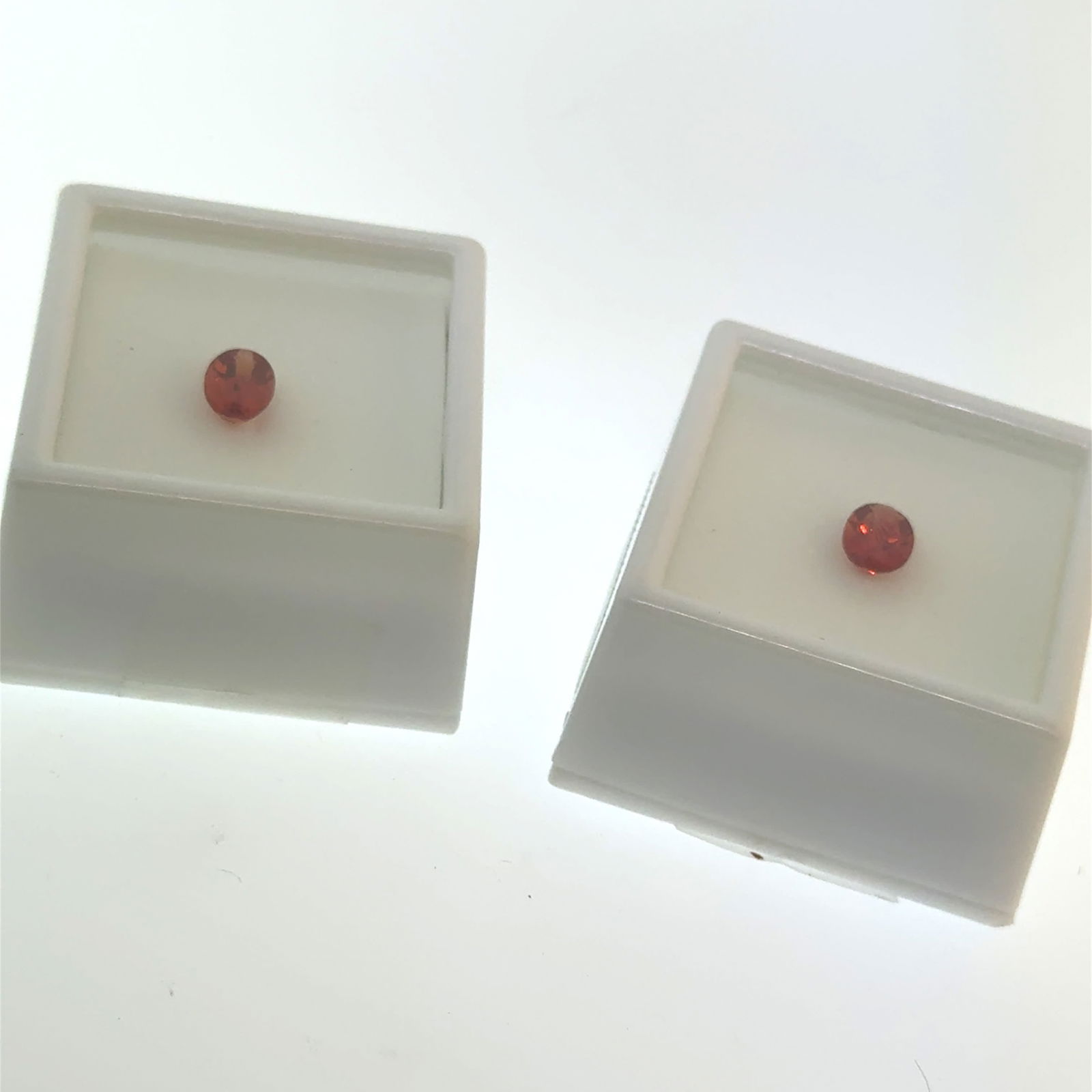 2 x .7ct Oval Cut Orange Labradorite Gemstones: This is a continuation of our pro jeweler's estate auction, but we've added some gems from another estate (JTV). The rest are from his personal collection, many faceted by himself. Gems were cataloged