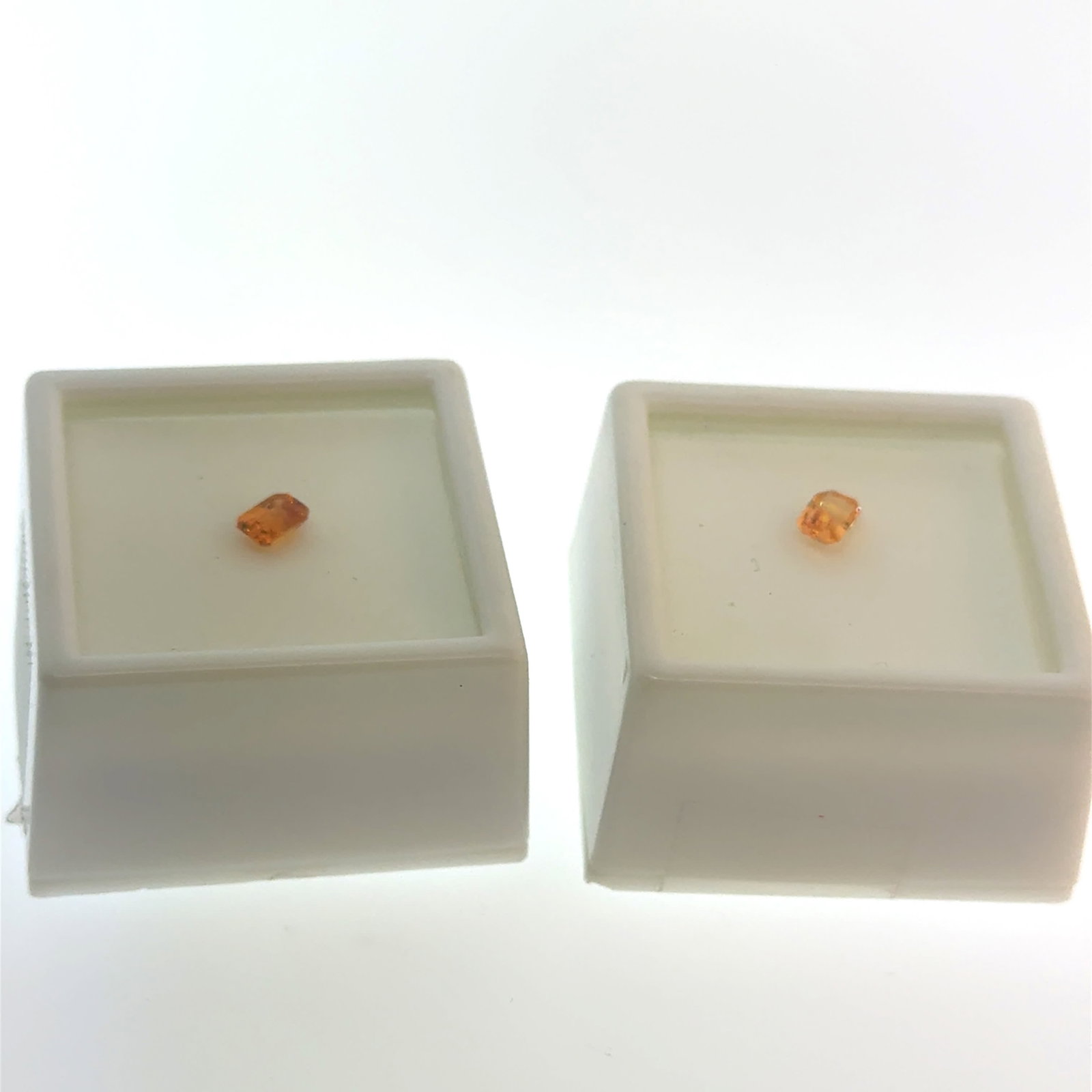 2 x Spessarite Garnet Gemstones .55ct: This is a continuation of our pro jeweler's estate auction, but we've added some gems from another estate (JTV). The rest are from his personal collection, many faceted by himself. Gems were cataloged