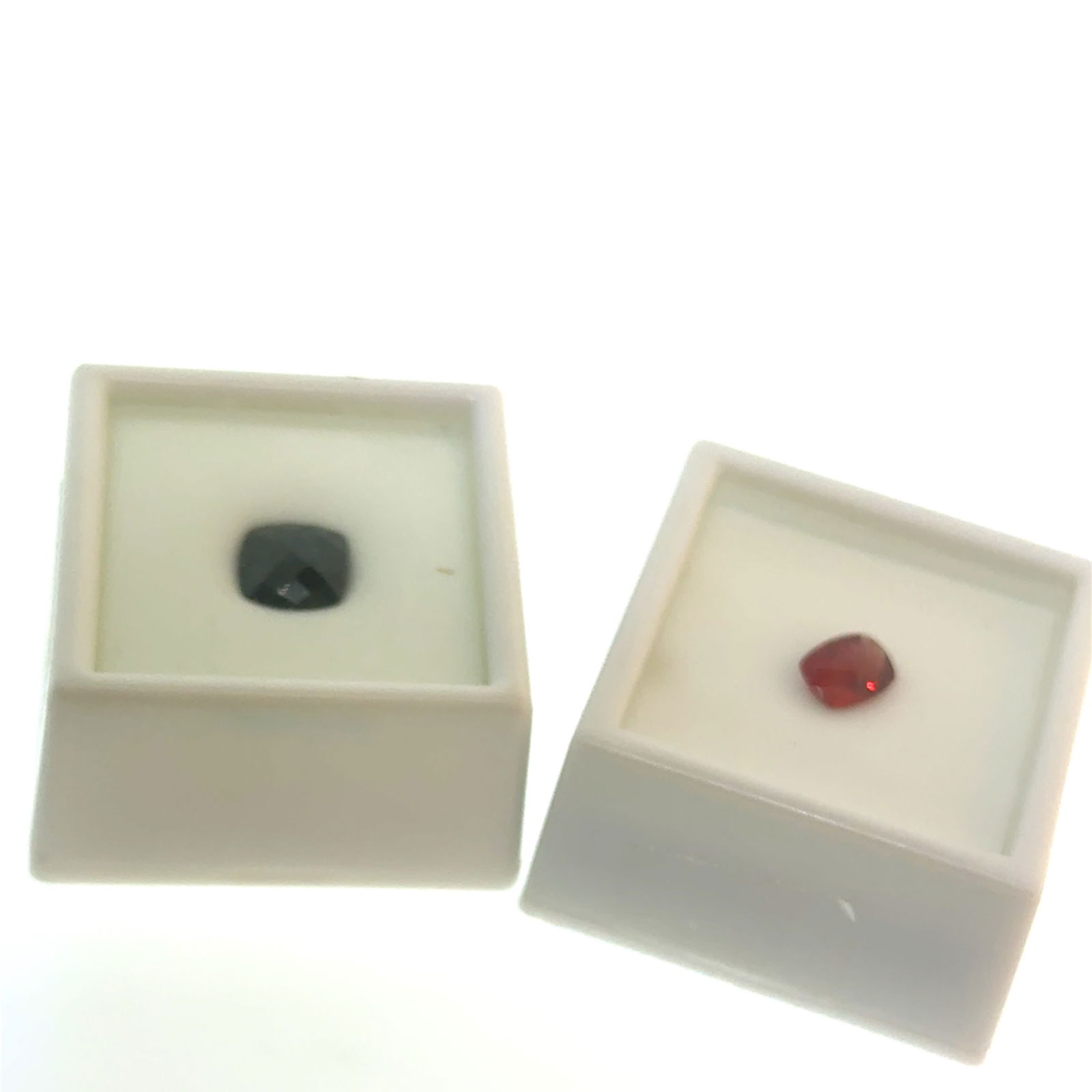 Cushion Cut Red Labradorite 8x6mm .95ct Gemstone + Criss Cross Cut 4.7ct 9.2x9mm Garnet: This is a continuation of our pro jeweler's estate auction, but we've added some gems from another estate (JTV). The rest are from his personal collection, many faceted by himself. Gems were cataloged