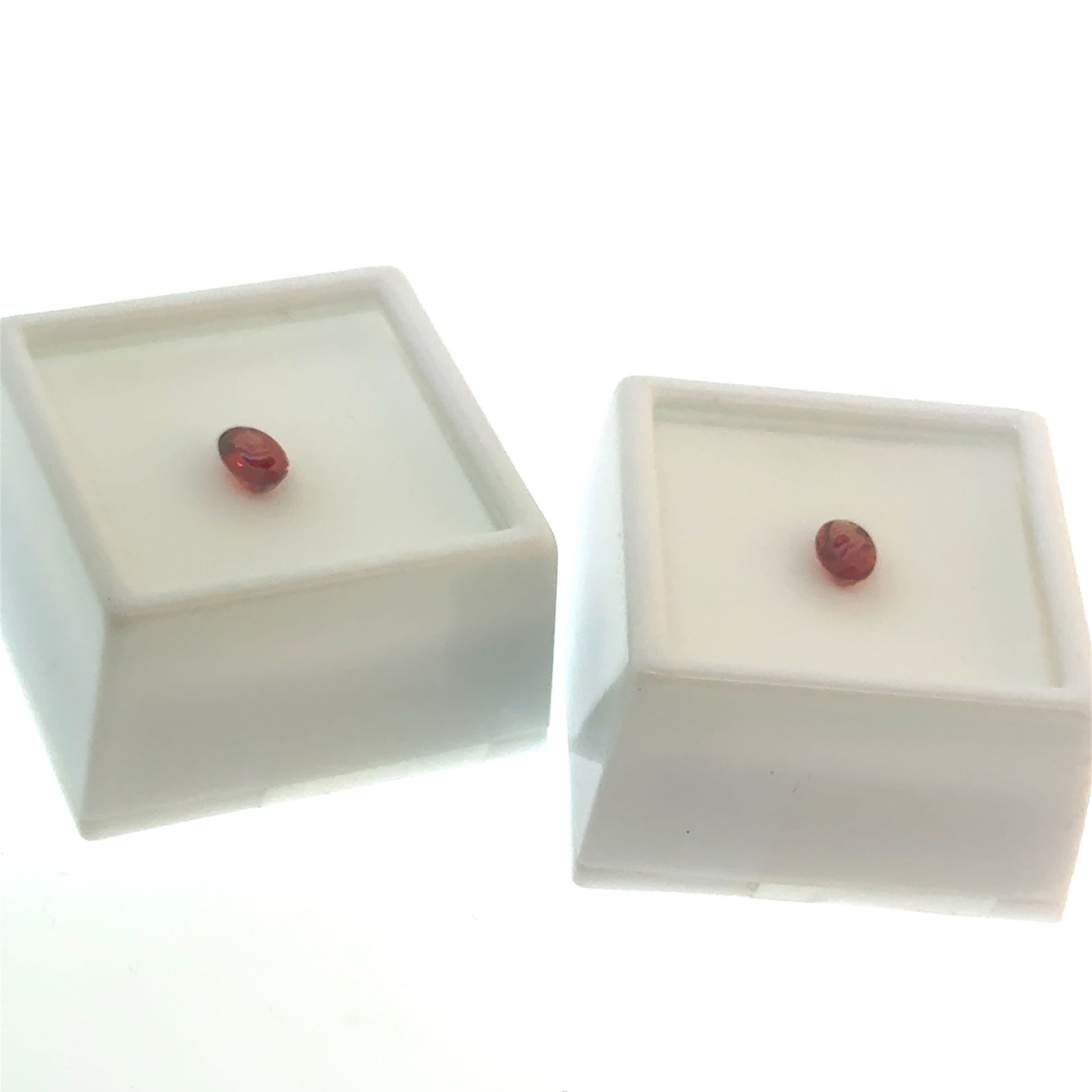 2 x Oval Cut Red Labradorite Gemstones .4ct 7x5mm: This is a continuation of our pro jeweler's estate auction, but we've added some gems from another estate (JTV). The rest are from his personal collection, many faceted by himself. Gems were cataloged