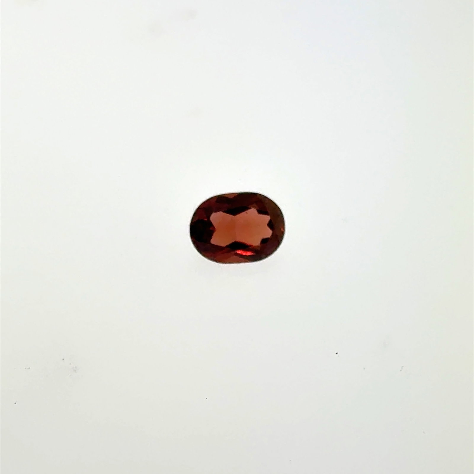 Garnet Gemstone Oval Cut 1.3ct 5.6x7.7mm: This is a continuation of our pro jeweler's estate auction, but we've added some gems from another estate (JTV). The rest are from his personal collection, many faceted by himself. Gems were cataloged