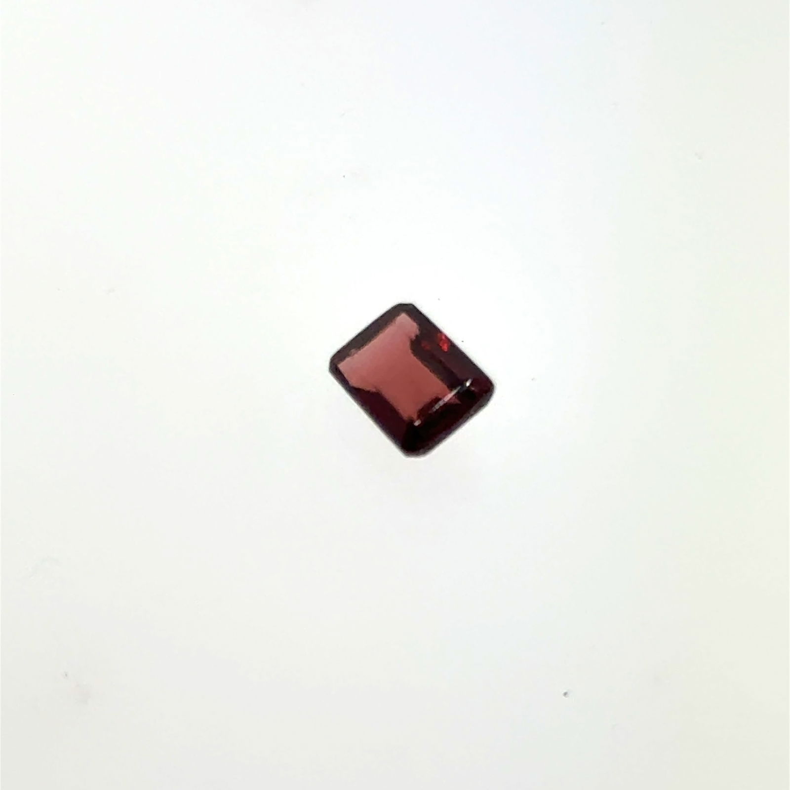 Emerald Cut Garnet Gemstone 1.25ct 6.3x5mm: This is a continuation of our pro jeweler's estate auction, but we've added some gems from another estate (JTV). The rest are from his personal collection, many faceted by himself. Gems were cataloged