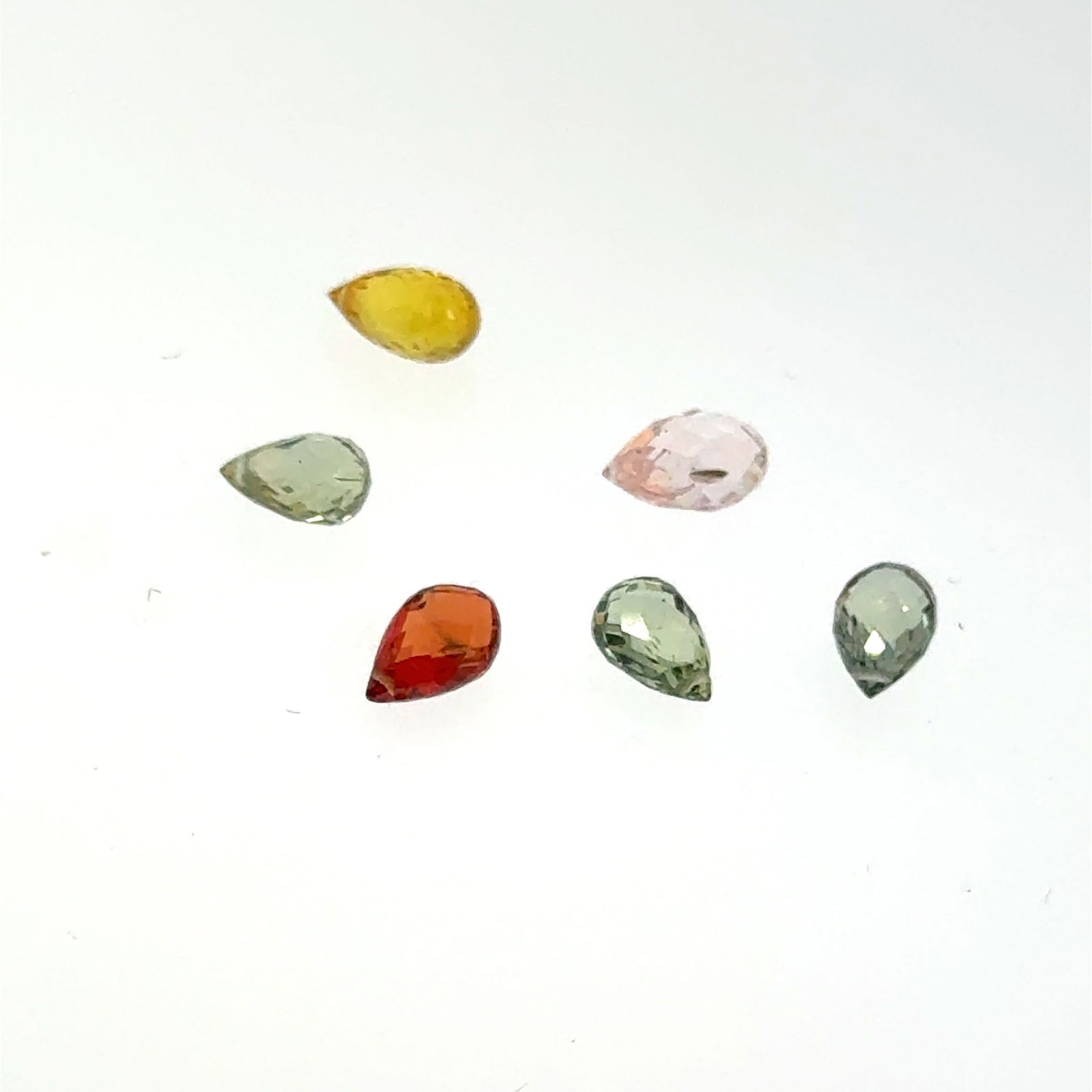 Briolette Cut Mixed Topaz Selection 4.3ct 3x5mm: This is a continuation of our pro jeweler's estate auction, but we've added some gems from another estate (JTV). The rest are from his personal collection, many faceted by himself. Gems were cataloged