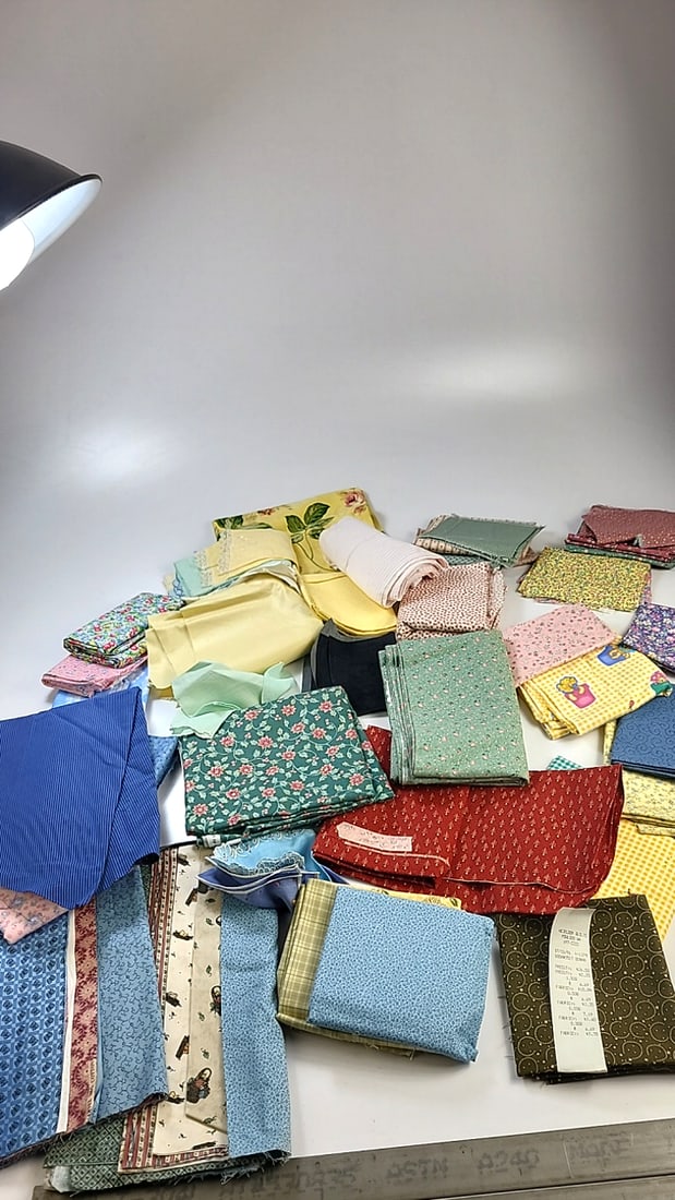 Vintage Fabric Lot 2 Cotton About 10 Yards Total: Large assortment of vintage fabric from an estate. Fabric is described as per the bolt it is on and measurements are approximate based on the updated bolt markings and counting wraps.Local pick up is