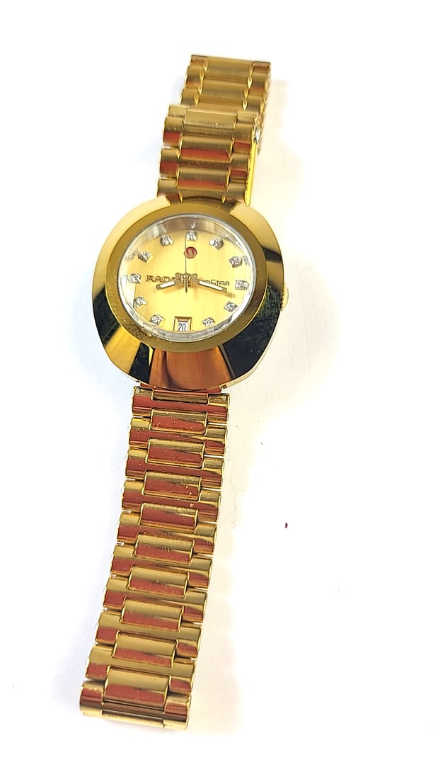 Rado DiaStar Gold Tone Diwmond Markers Analog Watch Working: This is an estate auction in Seattle WA featuring lady’s accessories and jewelry as well as other estate items.This auction offers local pick up in the Seattle area on 8/30 between 10am-3pm. If 