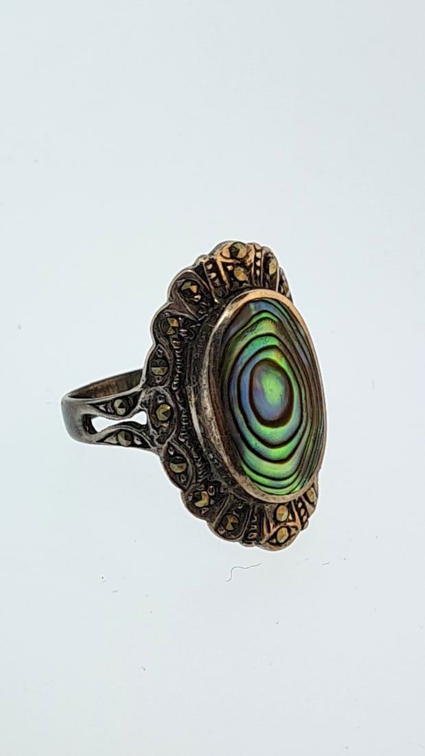 Sterling Marcasite and Opal Ring Size 6 4.8g: This is an estate auction in Seattle WA featuring estate jewelry and collectibles.This auction offers local pick up in the Seattle area on 9/13 between 10am-3pm. If you intend to pick up please ensure