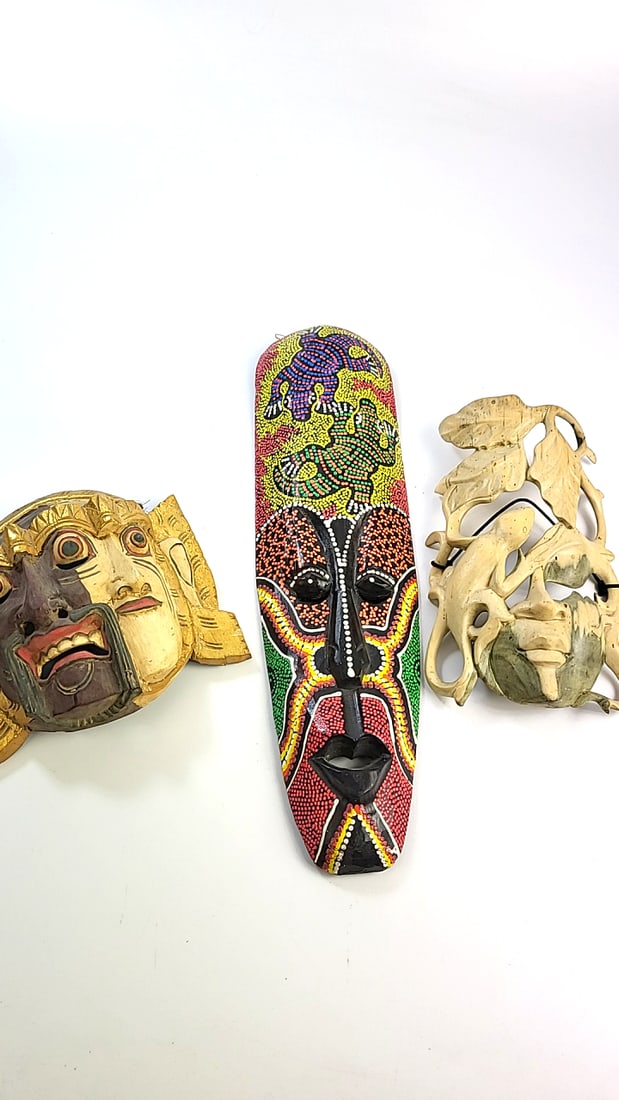 Trio of Carved Masks - Bali, New Zealand: This is an estate auction in Seattle WA featuring artwork, furniture, and general estate items.This auction offers local pick up in the Seattle area on 9/13 between 10am-3pm. If you intend to pick up,