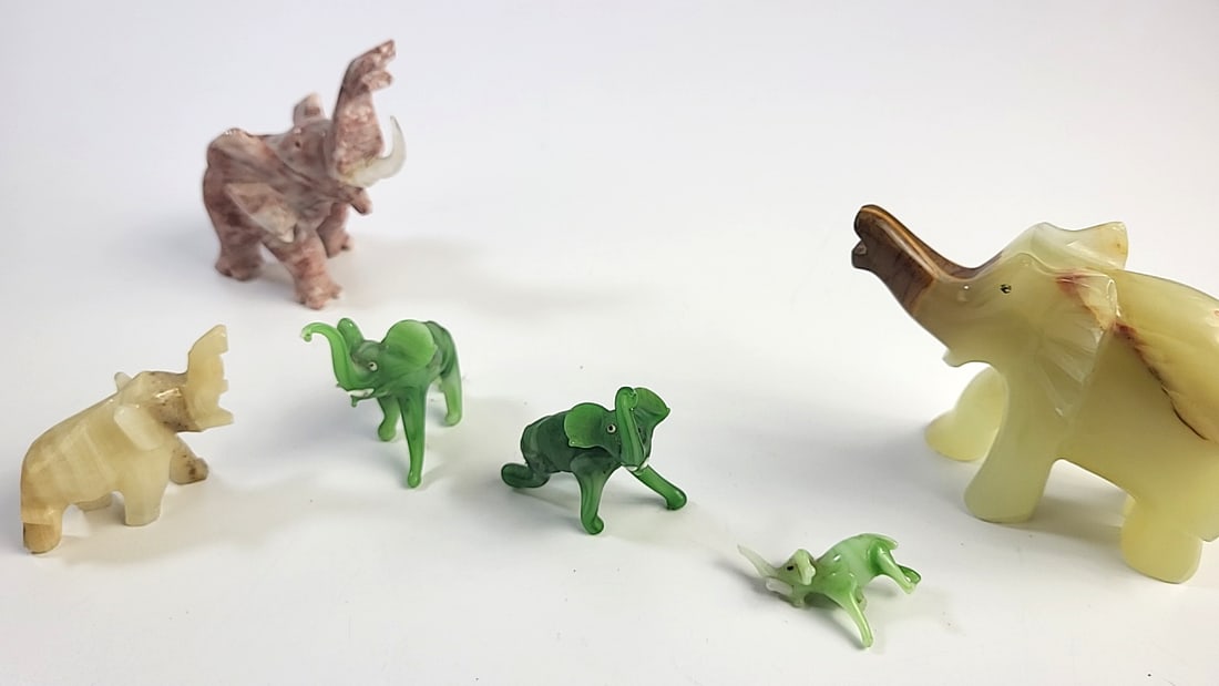 Selection of carved Stone elephants: This is an estate auction in Seattle WA featuring artwork, furniture, and general estate items.This auction offers local pick up in the Seattle area on 9/13 between 10am-3pm. If you intend to pick up,