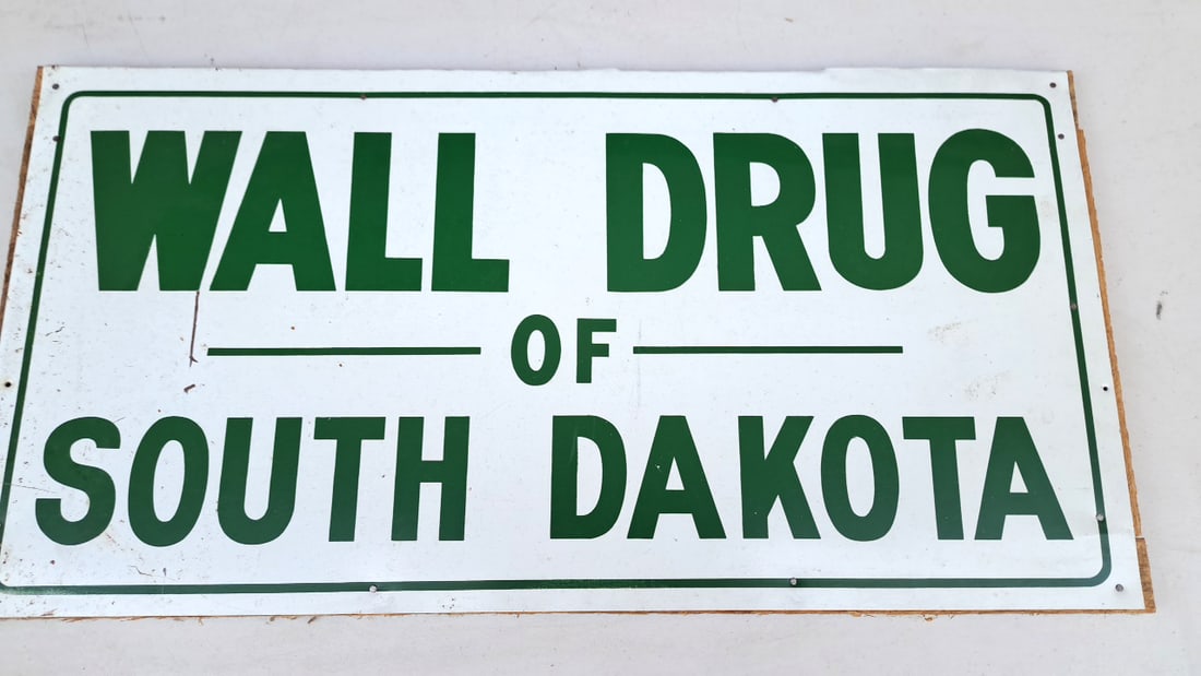 Vintage Wall Drug South Dakota Sign Green White Metal Johnson Johnson on Back: 24x12x1 5 READ: There are limited shipping options for this auction.This is an estate auction in Seattle WA featuring artwork, furniture, and general estate items.This auction offers local pick up in 
