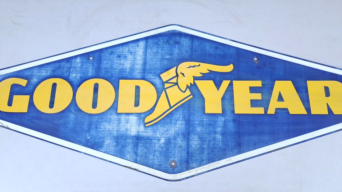 Vintage Goodyear Sign Blue Yellow Winged Foot Logo Metal Plaque Retro Decor (1 of 8)