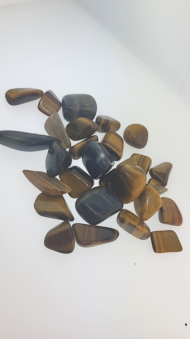 Polished Tiger's Eye Quartz 6oz: This is a continuation of our pro jeweler's estate auction. These are from his personal collection, many faceted by himself. Gems were cataloged with the assistance of GIA certified jewelers. Weights