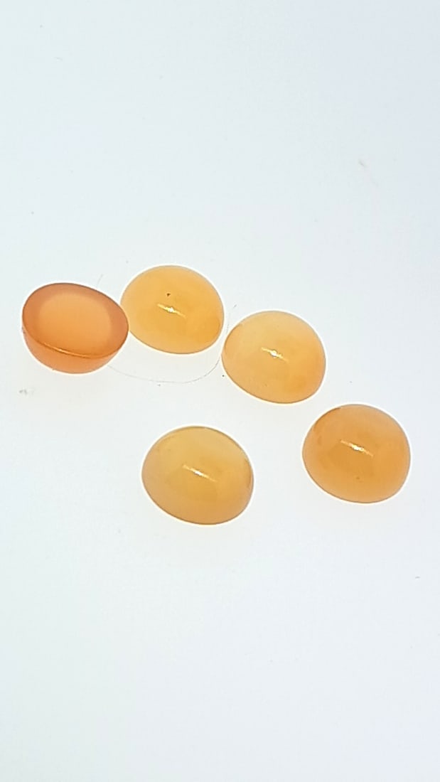 Peach Moonstone Round Cabochon 10mm 4g: This is a continuation of our pro jeweler's estate auction. These are from his personal collection, many faceted by himself. Gems were cataloged with the assistance of GIA certified jewelers. Weights 