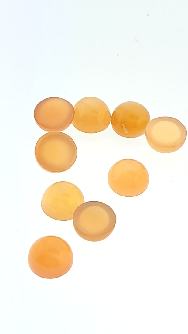 Peach Moonstone Round Cabochon 6.5mm 4g: This is a continuation of our pro jeweler's estate auction. These are from his personal collection, many faceted by himself. Gems were cataloged with the assistance of GIA certified jewelers. Weights 
