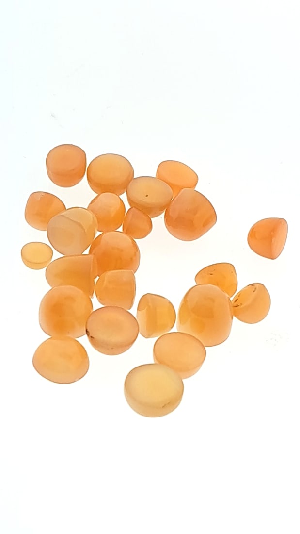 Peach Moonstone Mixed Cabochon 9.8g: This is a continuation of our pro jeweler's estate auction. These are from his personal collection, many faceted by himself. Gems were cataloged with the assistance of GIA certified jewelers. Weights 