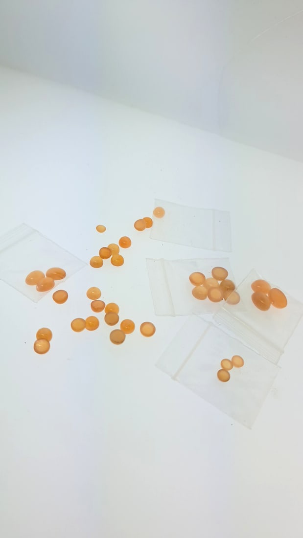 Peach Moonstone Mixed Cabochon 6g: This is a continuation of our pro jeweler's estate auction. These are from his personal collection, many faceted by himself. Gems were cataloged with the assistance of GIA certified jewelers. Weights 