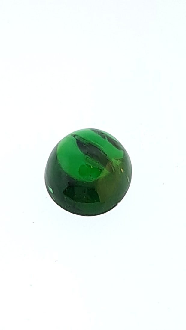 Emerald Cabochon 2.1c Mm 9x6mm: This is a continuation of our pro jeweler's estate auction. These are from his personal collection, many faceted by himself. Gems were cataloged with the assistance of GIA certified jewelers. Weights