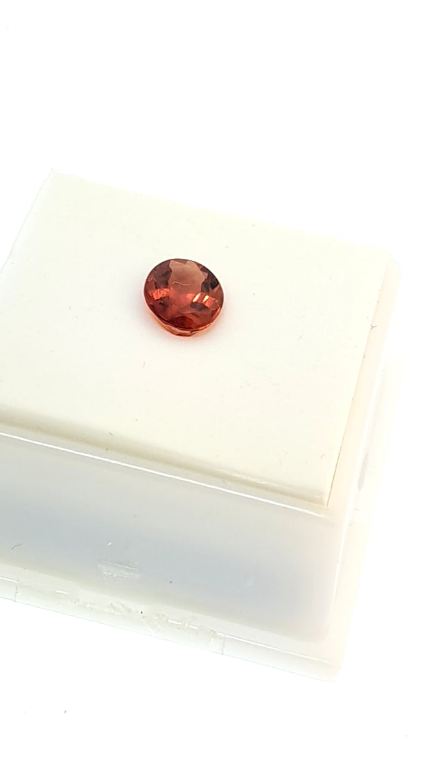 Red Labradorite 1.51ct 8.8x7mm: This is a continuation of our pro jeweler's estate auction. These are from his personal collection, many faceted by himself. Gems were cataloged with the assistance of GIA certified jewelers. Weights