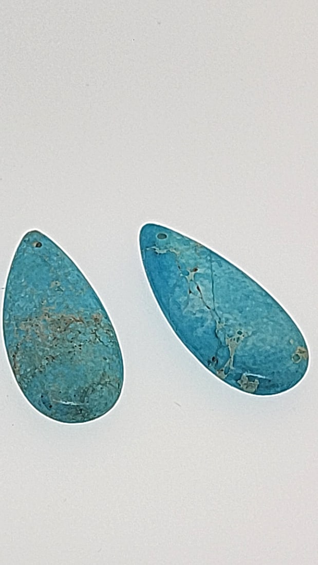 Synthetic Turquoise Teardrop Cabochon With Drilled Holes 35x15.5mm: This is a continuation of our pro jeweler's estate auction. These are from his personal collection, many faceted by himself. Gems were cataloged with the assistance of GIA certified jewelers. Weights 