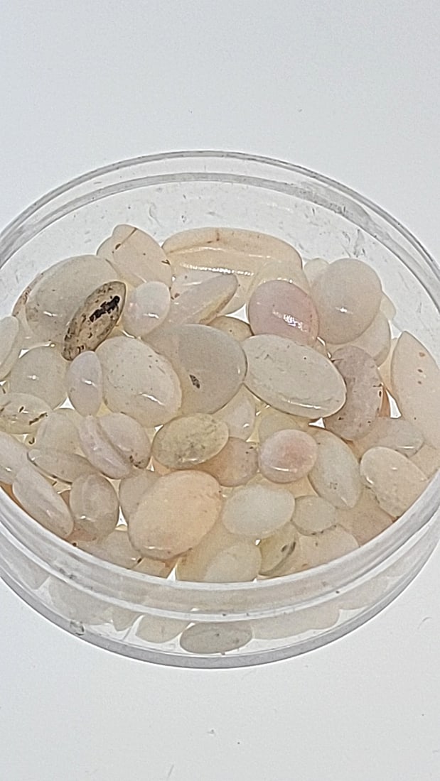 Opal Doublets 9.6g: This is a continuation of our pro jeweler's estate auction. These are from his personal collection, many faceted by himself. Gems were cataloged with the assistance of GIA certified jewelers. Weights