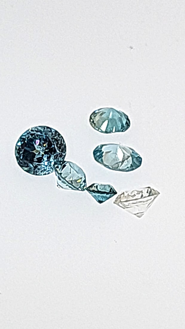 Brilliant Cut Blue Topaz Selection 10.76ct: This is a continuation of our pro jeweler's estate auction. These are from his personal collection, many faceted by himself. Gems were cataloged with the assistance of GIA certified jewelers. Weights