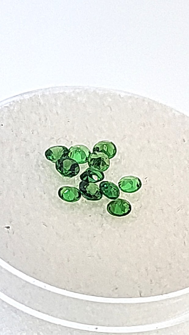2mm Emerald (presidium) Rounds .96ct: This is a continuation of our pro jeweler's estate auction. These are from his personal collection, many faceted by himself. Gems were cataloged with the assistance of GIA certified jewelers. Weights