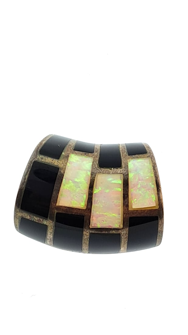 Sterling Onyx And Opal Pendant 7g: This jewelry auction is part of an estate sale on 11/7 in Edmonds WA. Pick up will be at the sale, details here https://www.estatesales.net/WA/Edmonds/98026/4683240. Items tested using Kee gold tester