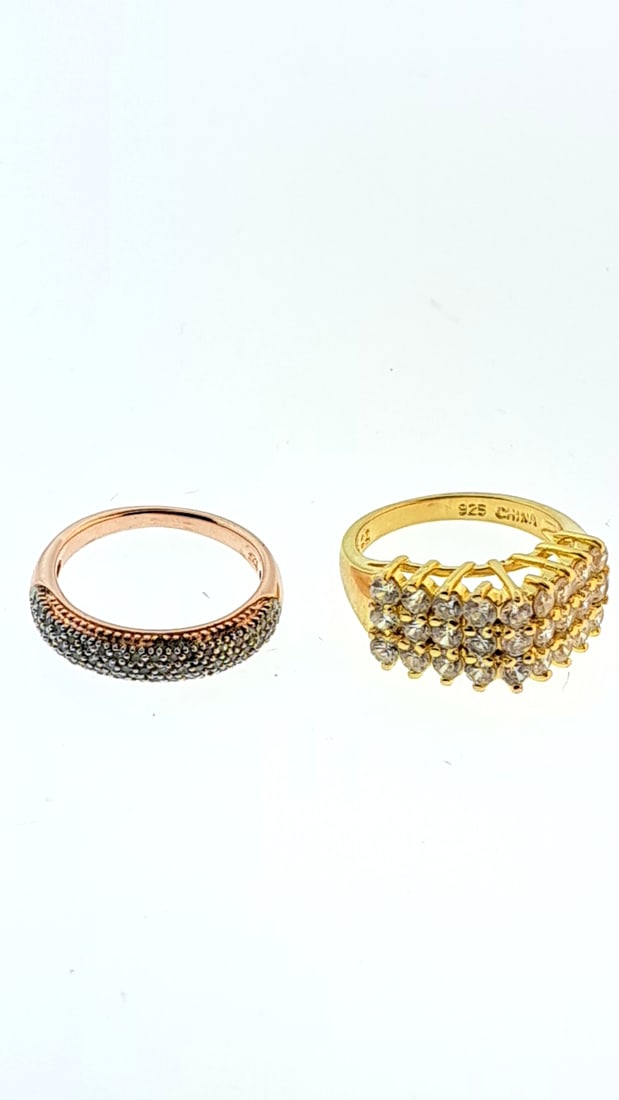 925 Sterling Silver Gold & Rose Gold Plated Rings Set With Stones, Size 6: This jewelry auction is part of an estate sale on 11/7 in Edmonds WA. Pick up will be at the sale, details here https://www.estatesales.net/WA/Edmonds/98026/4683240. Items tested using Kee gold tester