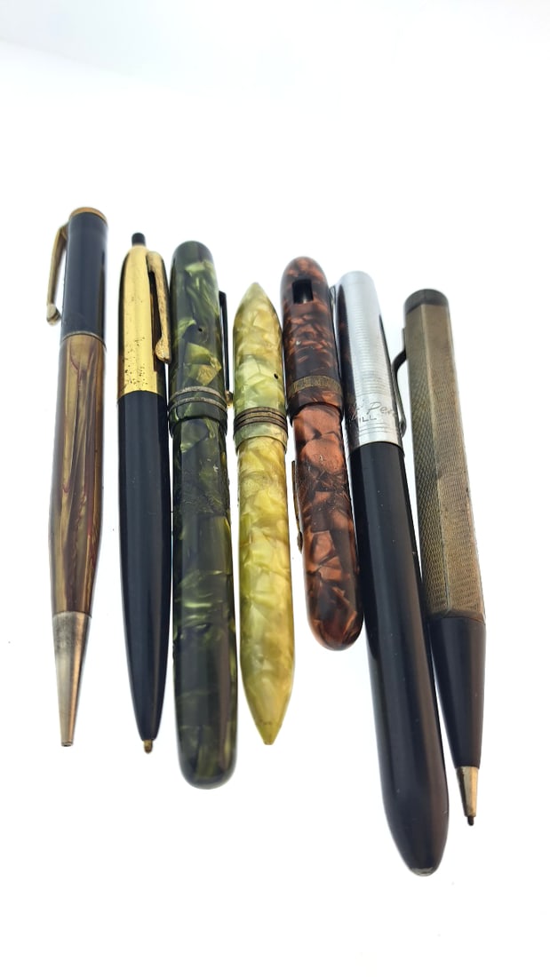 Mixed lot, vintage pens and pencils: "great selection of pens, watches, knives, and other gift items. Pens are in as found condition, please inspect pictures closely. Watches are working unless stated otherwise, however they may need nee