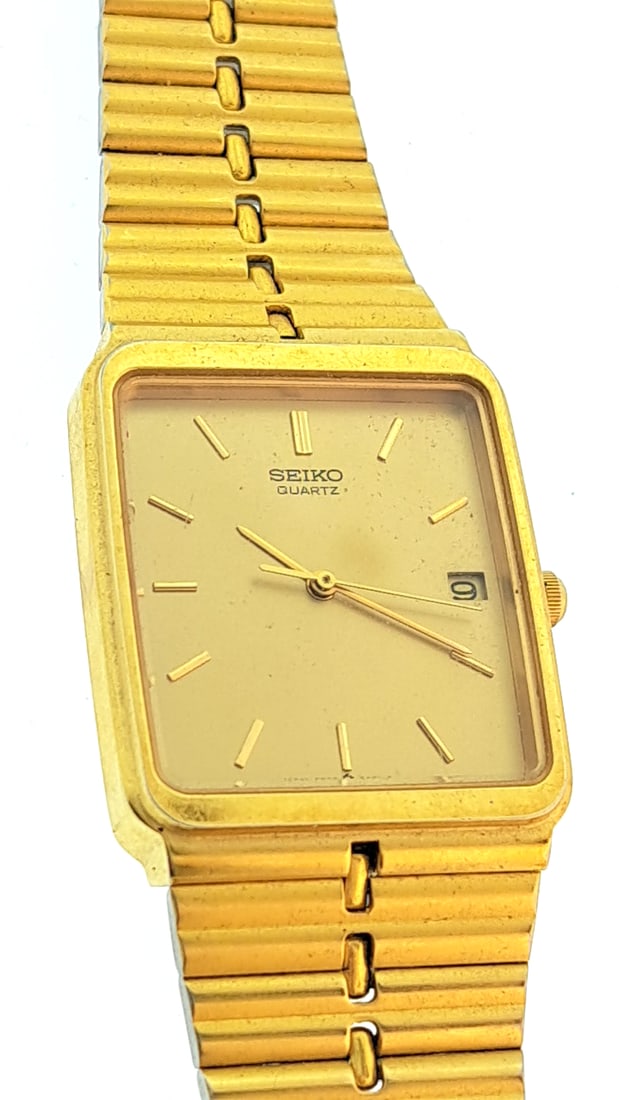 Seiko Quartz Gold Tone Square Face Wristwatch with Date Indicator 5p32-5a79 Runs Retirement 1978: "great selection of pens, watches, knives, and other gift items. Pens are in as found condition, please inspect pictures closely. Watches are working unless stated otherwise, however they may need nee