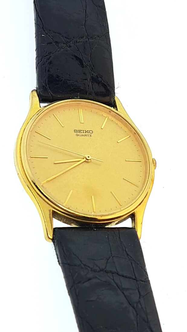 Seiko Quartz Gold Watch 7431-7009 Runs Black Leather Strap Analog Men's Timepiece: "great selection of pens, watches, knives, and other gift items. Pens are in as found condition, please inspect pictures closely. Watches are working unless stated otherwise, however they may need nee