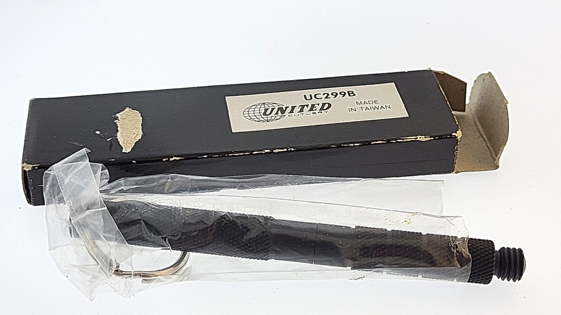 United Cutlery UC299B Black Keychain Knife Made in Taiwan: "great selection of pens, watches, knives, and other gift items. Pens are in as found condition, please inspect pictures closely. Watches are working unless stated otherwise, however they may need nee