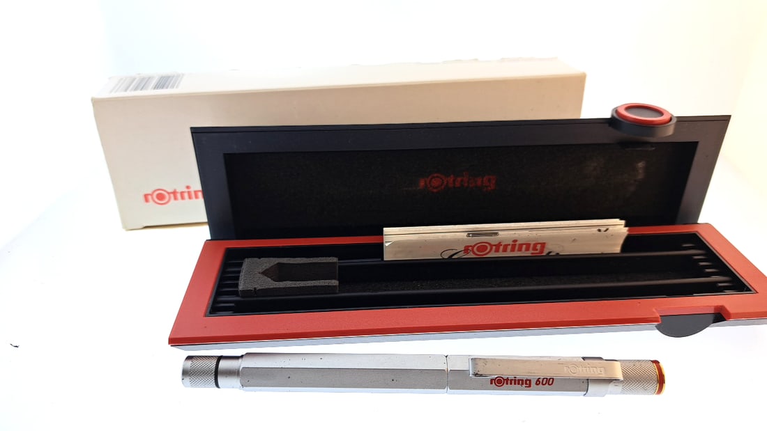 Rotring 600 Ballpoint Pen (needs ink) Silver with Case and Sleeve: Nice mix of estate goods. The family behind this estate had a high-end gift shop, so there's lots of brand new inventory including a large collection of King and Country, New ACME pens, quality watche