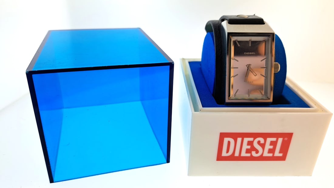 DIESEL Watch Rectangular Dial Black Strap Blue Packaging: Nice mix of estate goods. The family behind this estate had a high-end gift shop, so there's lots of brand new inventory including a large collection of King and Country, New ACME pens, quality watche