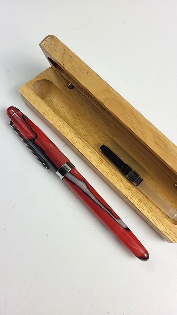 Retro 51 Red Fountain Pen with Wooden Case and Ink Converter: Nice mix of estate goods. The family behind this estate had a high-end gift shop, so there's lots of brand new inventory including a large collection of King and Country, New ACME pens, quality watche