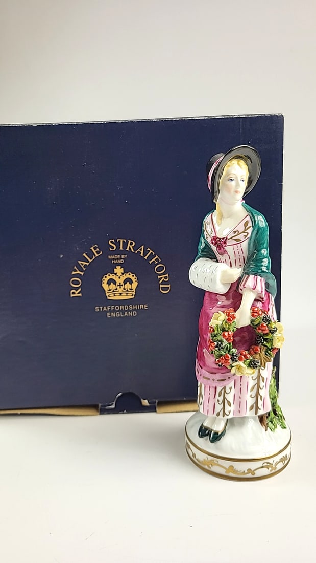 Royale Stratford Staffordshire Figurine Woman with Wreath Hand-Painted Porcelain Handmade Hand Pa...: Nice mix of estate goods. The family behind this estate had a high-end gift shop, so there's lots of brand new inventory including a large collection of King and Country, New ACME pens, quality watche
