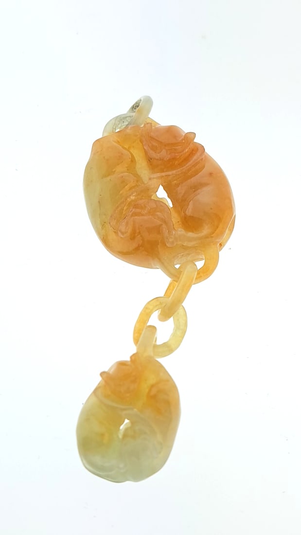 Carved Orange Jade Amulet Pendant with Linked Animal Design: Nice mix of estate goods. The family behind this estate had a high-end gift shop, so there's lots of brand new inventory including a large collection of King and Country, New ACME pens, quality watche