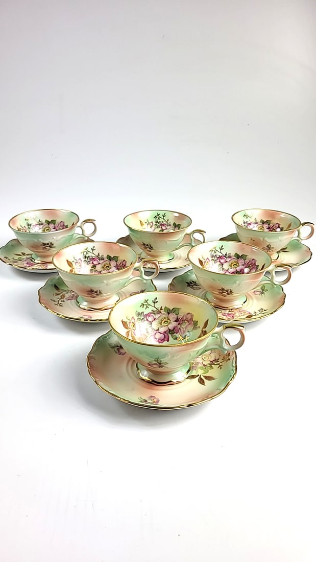 House of Goebel Porcelain Floral Tea Cup Set with Saucers - Pastel Green & Gold Trim - 6 Pieces: This is a general auction of estate goods. All items as as pictured. Local pick up will be on 3/14 at our warehouse in Sodo (3429 Airport Way S) from 10am-1pm. Items not picked up will be subjec