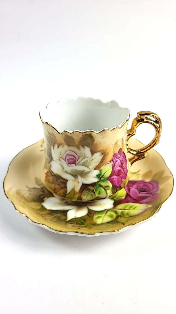Vintage Lefton Hand Painted Floral Porcelain Tea Cup Saucer Set with Gold Trim Roses Design: This is a general auction of estate goods. All items as as pictured. Local pick up will be on 3/14 at our warehouse in Sodo (3429 Airport Way S) from 10am-1pm. Items not picked up will be subjec to a