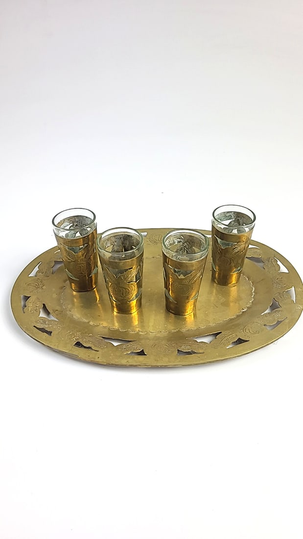 Vintage Gold-Tone Metal Wrapped Shot Glass Set with Metal Tray - 4 Pieces - Decorative Design: This is a general auction of estate goods. All items as as pictured. Local pick up will be on 3/14 at our warehouse in Sodo (3429 Airport Way S) from 10am-1pm. Items not picked up will be subjec