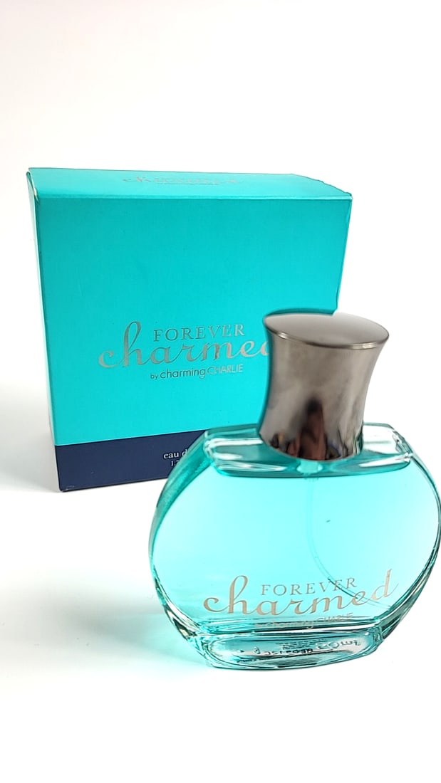 Charming Charlie Forever Charmed Perfume Eau de Parfum Teal Bottle: This is a general auction of estate goods. All items as as pictured. Local pick up will be on 3/14 at our warehouse in Sodo (3429 Airport Way S) from 10am-1pm. Items not picked up will be subjec
