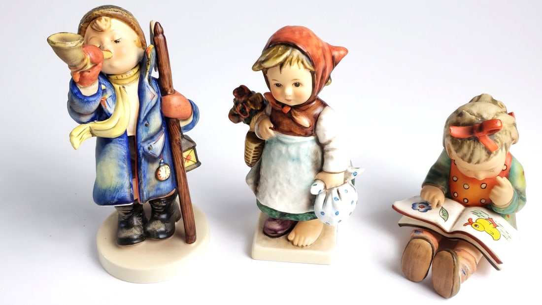 Hummel Figurines Set of 3 - Boy with Horn, Girl with Flowers, Girl Reading Book: Great Height: 5 High Estimate: 300 Low Estimate: 30 Width: 5