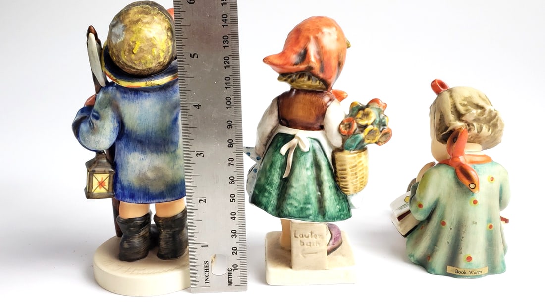 Hummel Figurines Set of 3 - Boy with Horn, Girl with Flowers, Girl Reading Book - 3