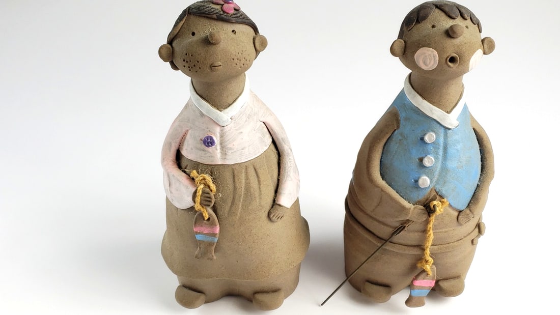 Vintage Ceramic Figurines of Boy and Girl Holding Fish: Good, small hairline crack in male, its fine Width: 4 Height: 4 Low Estimate: 15 High Estimate: 75