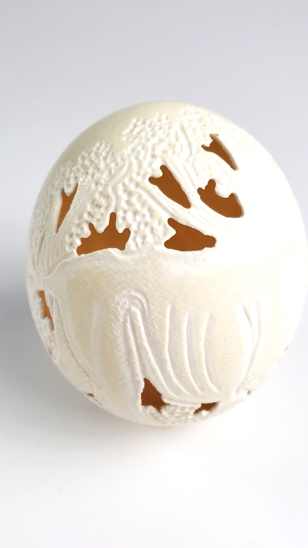 Intricately Carved White Ceramic Sphere-Egg Ornament - Bone Chjna: Great Width: 3 Height: 4 High Estimate: 150 Low Estimate: 20