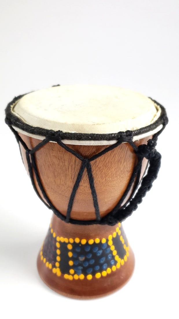 Small 6" Wooden Djembe Drum with Painted Design and Black Rope Tensioning: Great Width: 3 High Estimate: 80 Height: 4 Low Estimate: 30