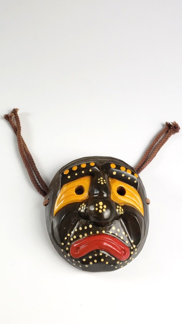 Handcrafted Painted Wooden Tribal Mask with Rope & Metal Hanger: Great Height: 5 Width: 2 High Estimate: 100 Low Estimate: 25